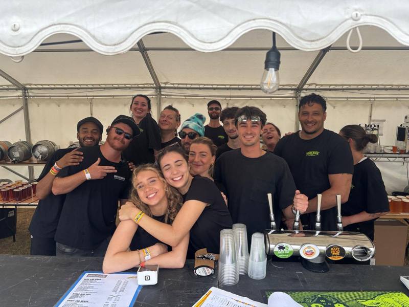 IF-IT Events bar team behind a festival bar